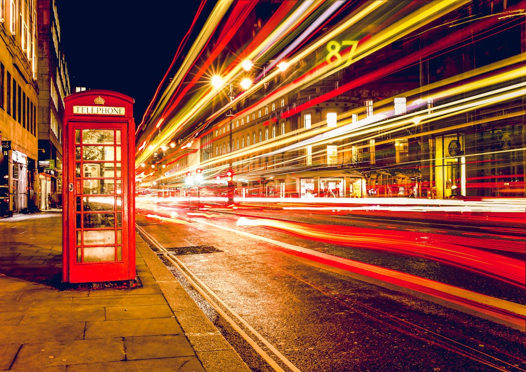 London city street with a red phone box.