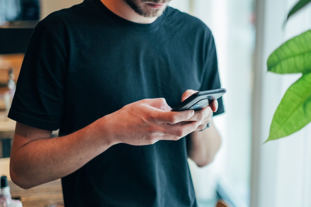 Man receiving a text message.