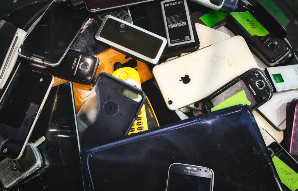 Broken smartphones for recycling.